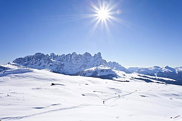 Snow-covered landscape, view during the ascent of Cima Bocche Mountain above Passo Valles, Dolomites, looking towards the Pala Group beside the Passo Rolle, Trentino, Italy, Europe