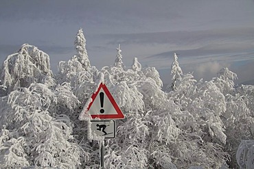 Snow-covered warning sign on Mt Schauinsland, Black Forest, Freiburg district, Baden-Wuerttemberg, Germany, Europe