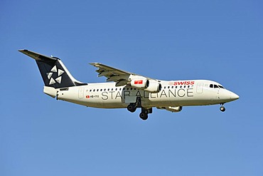 Star Alliance BAE Systems Avro 146-RJ100 during the landing approach to Zurich Airport, Zurich, Switzerland, Europe