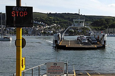 Car ferry crossing the Dart River in Kingswear, traffic light on the left, Devon, England, United Kingdom, Europe