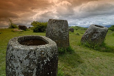 Archeology, ancient large stone jars in the landscape, Plain of Jars, Jar Site 1, Thong Hai Hin, near Phonsavan, province of Xieng Khouang, Laos, Southeast Asia, Asia