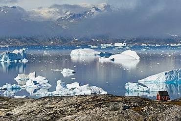 House, Inuit settlement of Tiniteqilaaq, icebergs in Sermilik Fjord, East Greenland, Greenland