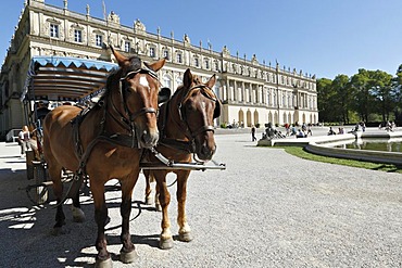 Horse carriage in front of Schloss Herrenchiemsee Palace, Herreninsel island, Chiemgau, Upper Bavaria, Germany, Europe