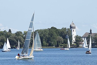 Sail boats off Fraueninsel island on lake Chiemsee, Chiemgau, Upper Bavaria, Germany, Europe