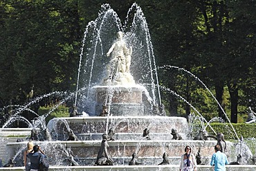 Tourists and the Latona Fountain in the Herrenchiemsee Gardens, Herreninsel, lake Chiemsee, Chiemgau, Upper Bavaria, Germany, Europe