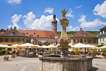 Rococo fountain on the market square in Weikersheim, looking towards the castle and a cafe, Baden-Wuerttemberg, Germany, Europe