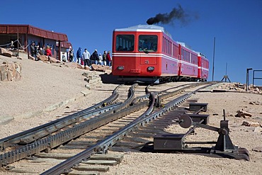 The Manitou and Pikes Peak Railway near the summit of Pikes Peak; the cog railway takes tourists to the top of the 14, 100-foot mountain, Colorado Springs, Colorado, USA