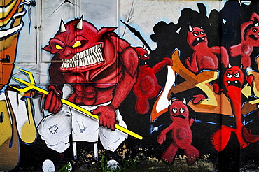 "True Devils" graffiti opposite the Theater-Halle 7, Gerolsteiner Ring, Munich, Bavaria, Germany, Europe, PublicGround