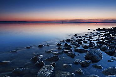 Stones on the shores of Lake Constance just after sunset, Immenstaad, Bodenseekreis district, Baden-Wuerttemberg, Germany, Europe, PublicGround