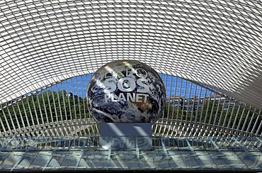 Entrance of the station concourse, a globe with the inscription "EXPO SOS Planet" as a reference to the candidacy of Liege for the World's Fair 2017, Gare de Liege-Guillemins railway station, architect Santiago Calatrava, Liege, Luik, Wallonia, Belgium, E