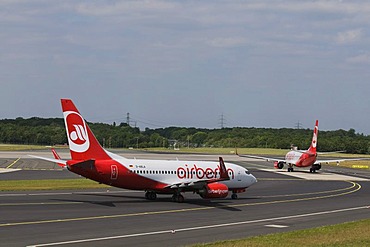 Two airberlin airplanes taking a curve, Duesseldorf International Airport, Duesseldorf, North Rhine-Westphalia, Germany, Europe