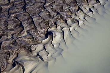 Sand structures on stream from the Vatnajoekull glacier, in Joekulheimar, south Iceland, Europe