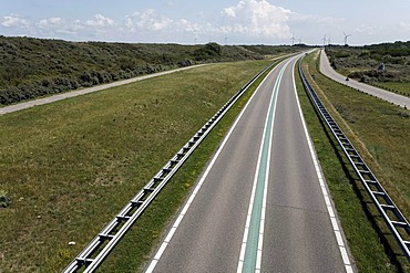 Street with a green median strip, traffic free, Veerse Dam between Walcheren and Noord-Beveland, Zeeland, Netherlands, Europe