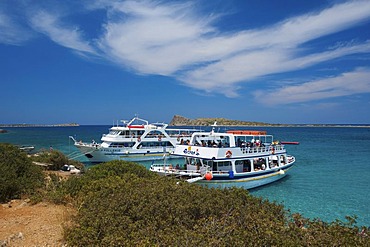 Excursion boats on the beach of Kolokythas on Spinalonga in Elounda, Crete, Greece, Europe