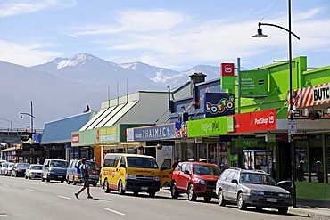 Main street of Kaikoura, Seaward Kaikoura Ranges at the back, South Island, New Zealand