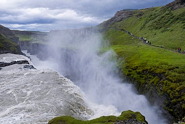 Tourists at the Gullfoss waterfall, Iceland, Europe