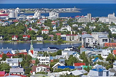 Downtown from the tower of the Hallgrimskirkja church with Tjoernin city lake with and city hall, Reykjavik, Iceland, Europe