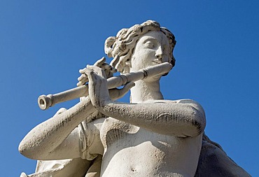 Baroque sculpture of flute player in Belvedere Palace Park, Wien, Vienna, Austria, Europe