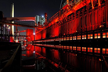 Industrial buildings illuminated at night, Zeche Zollverein Coal Mine, Oberhausen, North Rhine-Westphalia, Germany, Europe