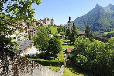 Old city walls around the medieval town of Gruyeres, Fribourg, Switzerland, Europe