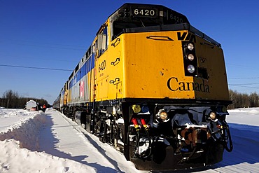 Ice-covered train on the railway line between Winnipeg and Churchill, Manitoba, Canada