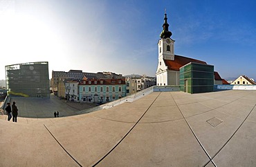 Ars Electronica Center and Uhrfahr parish church in Linz, Upper Austria, Austria, Europe