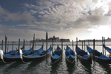 Gondolas along the Riva degli Schiavoni waterfront, Venice, Veneto, Italy, Southern Europe