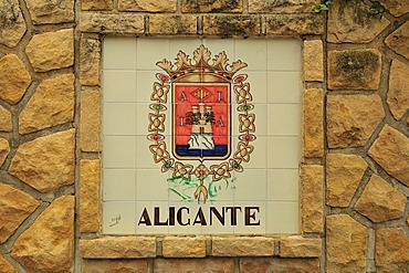 Fountain with coat of arms of the surrounding towns, here Alicante, mountain village of Polop de la Marina, Costa Blanca, Spain, Europe