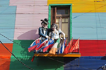 Two statues on a balcony, El Caminito street, La Boca district, Buenos Aires, Argentina, South America