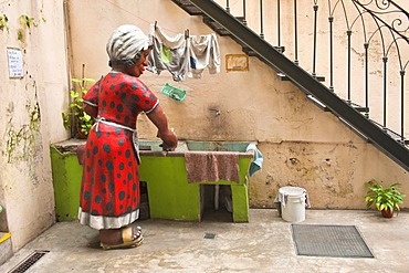 Sculpture of a woman at a sink, El Caminito street, La Boca district, Buenos Aires, Argentina, South America