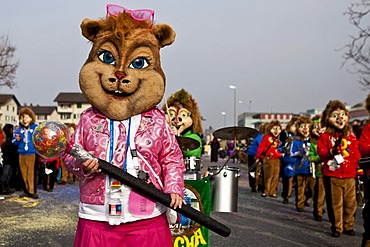 Guggenmusik Ruessboelle Reussbuehl music group dressed to the theme of the Chipmunks during the carnival procession, Littau, Lucerne, Switzerland, Europe