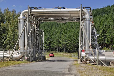 Geothermal power plant, Wairakei Borefield, pipelines crossing a road, North Island, New Zealand