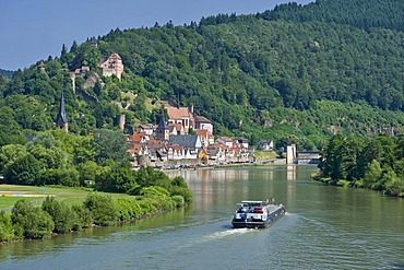 Townscape with the Neckar river and a cargo ship, Hirschhorn, Neckartal Odenwald Nature Park, Hesse, Germany, Europe