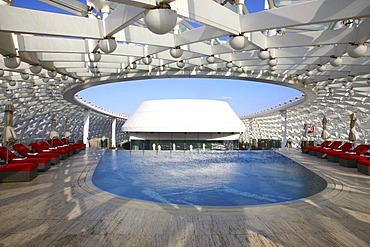 Hotel pool on the roof of the Yas Hotel on Yas Island, futuristic luxury hotel in the middle of the Formula 1 race track of Abu Dhab, United Arab Emirates, Middle East, Asia