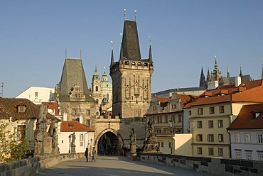 On the Charles Bridge, view to the Powder Tower, old town, UNESCO World Heritage Site, Prague, Czech Republic, Europe