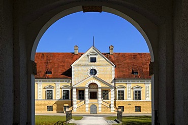 Entrance facade of Old Schleissheim Palace, 1617 - 1623, seen through an archway, Maximilianshof courtyard, Oberschleissheim, Bavaria, Germany, Europe