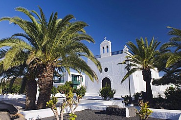 Church and palm trees, Uga, Lanzarote, Canary Islands, Spain, Europe