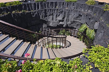 Spiral staircase leading downward into a lava cave, Casa Museo del Campesino farm museum, Mozaga, Lanzarote, Canary Islands, Spain, Europe