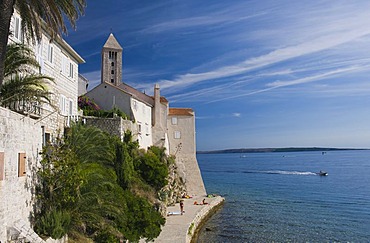 Promenade on the coast and view on the steeples of the town of Rab, Rab island, Kvarner Gulf, Croatia, Europe