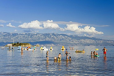 Holidaymakers bathing off paradise beach, San Marino, Rab island, Kvarner Gulf, Croatia, Europe