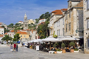 Restaurants and cafes on St. Stephen's Square, town of Hvar, Hvar Island, Dalmatia, Croatia, Europe