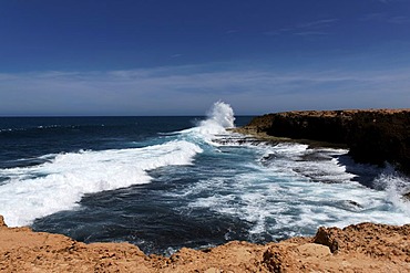 Waves breaking along coastline, North Western Australia