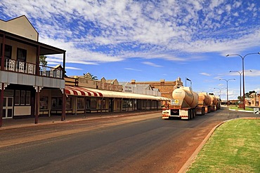 Shops and trucks in Austin Street, Cue Murchison, Western Australia, Australia