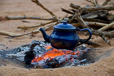 Pot of tea on a camp fire, Tadrat, Algeria, Africa