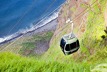 Cable car to the fields and plantations on the rock cliffs of the Atlantic coast, at Achadas da Cruz, Madeira, Portugal, Europe