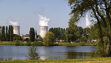 Two cooling towers of the French Cattenom Nuclear Power Plant, the church of Cattenom standing between the cooling towers, Lorraine region, France, Europe