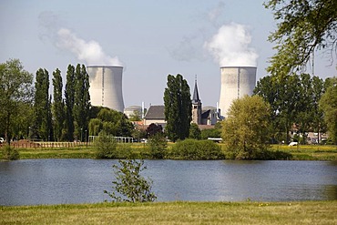 Two cooling towers of the French Cattenom Nuclear Power Plant, the church of Cattenom standing between the cooling towers, Lorraine region, France, Europe