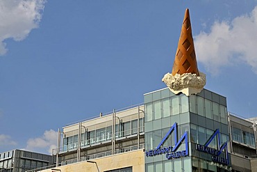 Dropped Cone sculpture, by Claas Oldenburg and Coosje van Bruggen, art on a building, Neumarkt square, Cologne, North Rhine-Westphalia, Germany, Europe