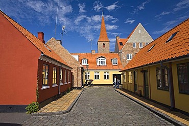 Street, houses and church in Ronne, Bornholm, Denmark, Europe