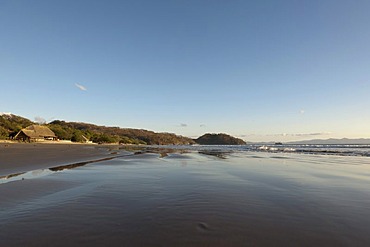 The somewhat remote and sandy beach of Playa Coco, Pacific Coast, Nicaragua, Central America